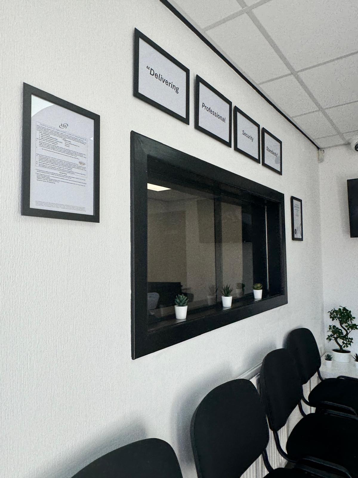 PSG UK Glasgow office reception area with company values on the wall